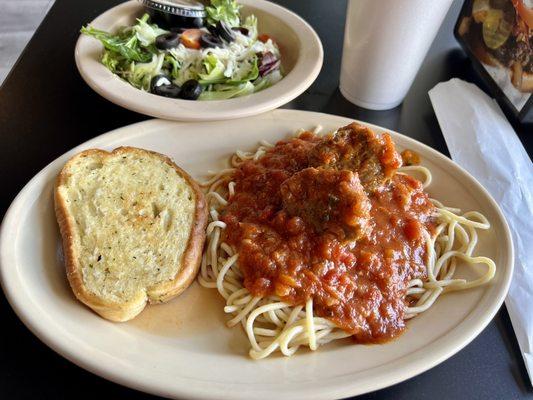 Spaghetti and Meatballs: the Thursday Lunch Special. Includes the salad & bread but not the drink.