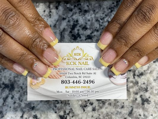 manicure with yellow tip gel color