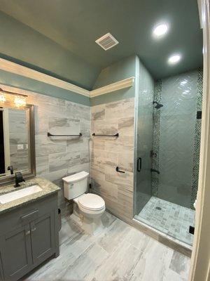 Creating two separate bathroom from an old j&j bathroom