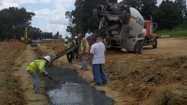 Flowable fill over a pipe.