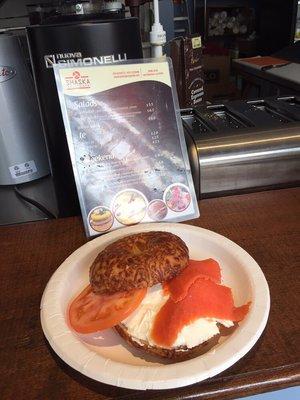 Bagel cream cheese w/ tomatoes and salmon