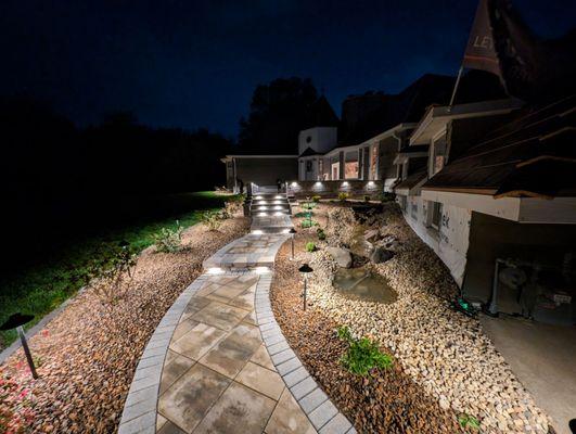 The lighting Nino added to the patio that he built with a pond!