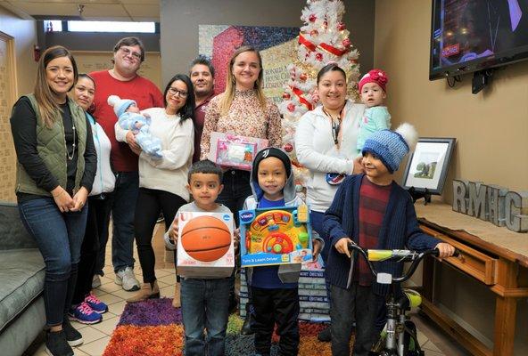 NEC employees donated brand new gifts to the children and families of the Ronald McDonald House Charities of Corpus Christi