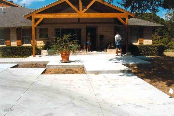 Concrete Driveway and Raised Porch with Cut Outs for Landscaping