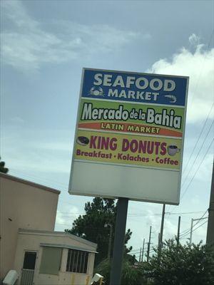 Signage. Get some fresh seafood and then go next-door for awesome donuts.