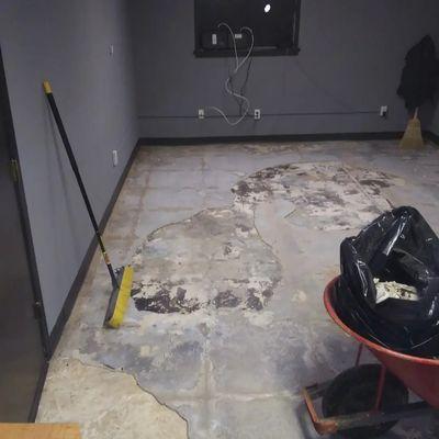 demoing a floor after it got water damaged.