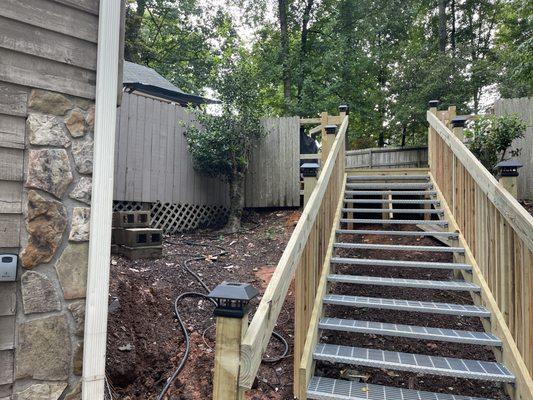 Stairs built to access a backyard