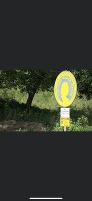 Izaak Walton sign on island beach