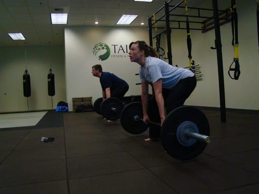 Husband and wife getting strong together.