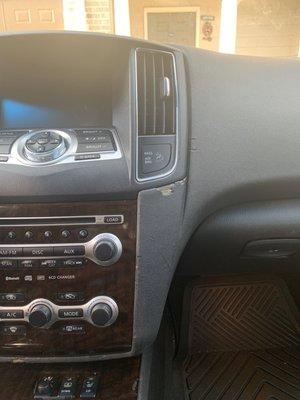 Car damage - peeled dashboard looks like they tried to force out with a screwdriver