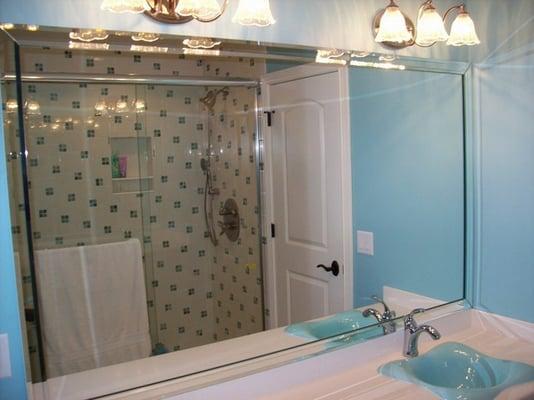 Mirror and shower enclosure