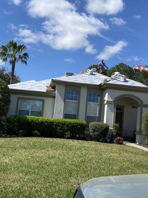 Loading shingles on roof