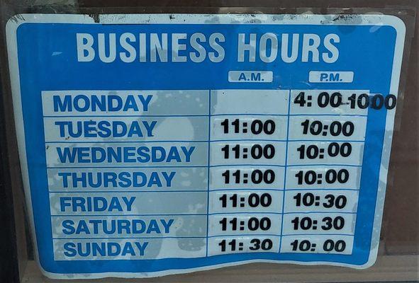 These are the business hours for China Hut.  Photo taken May 13, 2020.