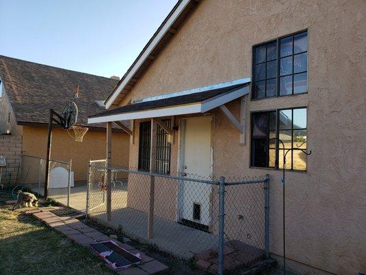 A new awning, braces were temporary.