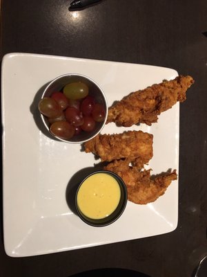 Kid's chicken tenders were so hard we could barely get a steak knife through them. Inedible