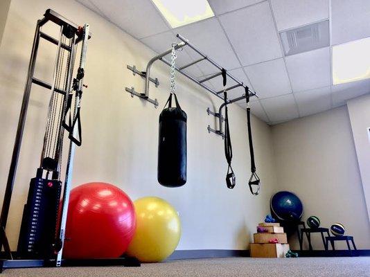 Athlon Physical Therapy TRX training, Knock Out Parkinson's, and strength training area.