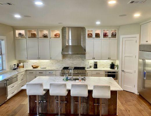 Aggieland Lookout | Fully stocked kitchen with refrigerator, dishwasher, and seating for 16 guests