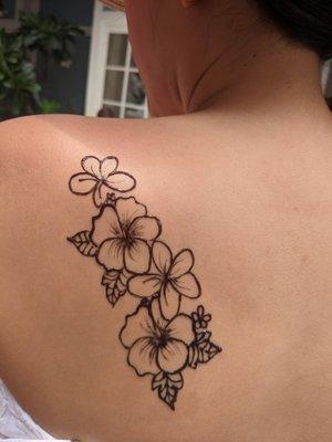 Hibiscus and plumeria jagua tattoo