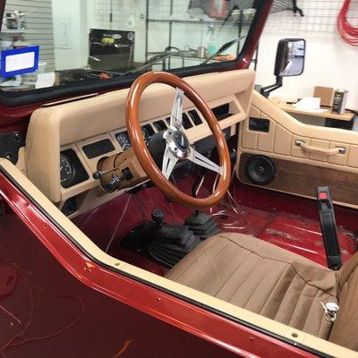 The interior was done as well, the steering column was the original paint color to show the difference, they painted the steering column too