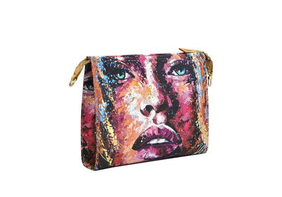 Bagghy&Terrin art collection a limited edition with serial number inside.  http://www.bagghy.us/product-category/trousse-bagghy-terrin/