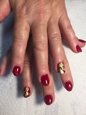 Good old gold foil with gel polish top coat create a beautiful shiny look