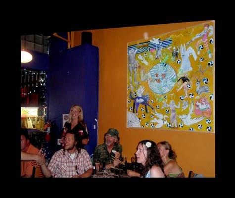 The Moetone revelry at Stonefish Sushi & More, 16 W Main, June 18, '11 in front of,"The Pond," Sonja Horoshko, Oil canvas.