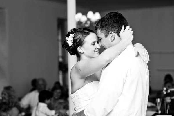 bride and groom enjoying their first dance together