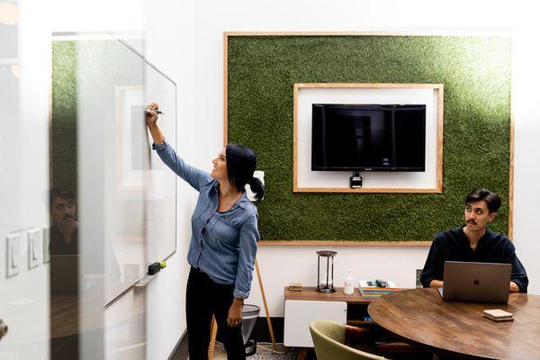 Small Conference Room with white board, HDMI cord, Apple TV. Can seat up to 6 people.