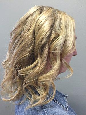 Natural hair that is Hi-lighted and curled