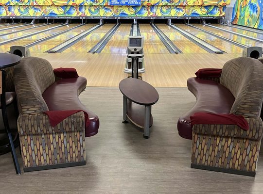 An old-style sitting area on some of the lanes. Other lanes have more conventional tables.