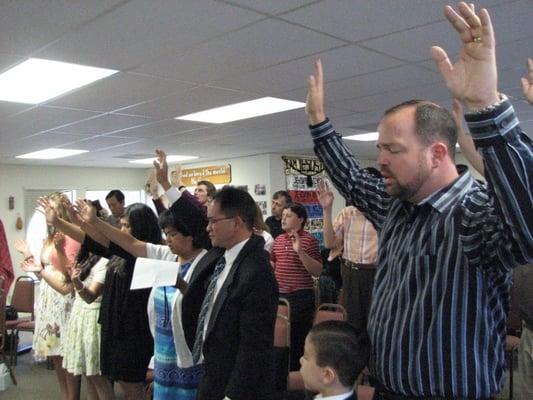 Lifting hands in Worship