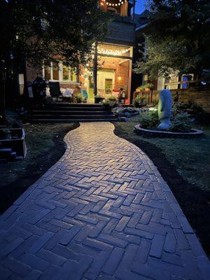 Picture is a paver walkway. Material used is Unilock Copthorne.