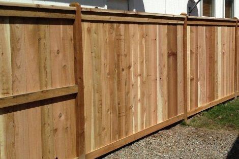 Rolling gate with cedar privacy.