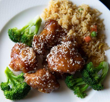 Sesame chicken with roccoli and  fried rice. Only part of order  -- plated at home.