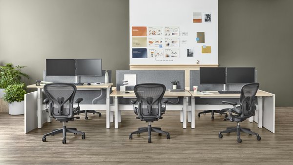 Sit to stand table by Herman Miller