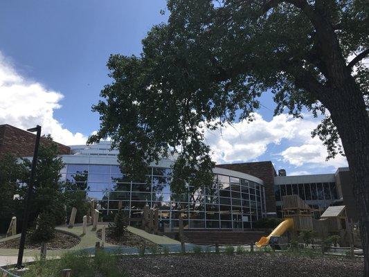 View from the parking lot, playground and creek close by!