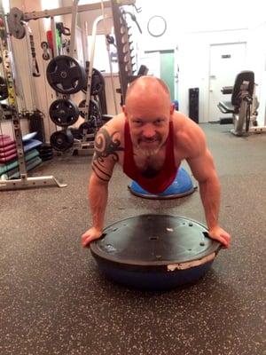 Andrew put on 5lbs of lean muscle and in perfect form doing push ups using two Bosu's. Great for chest, shoulders, triceps and core.