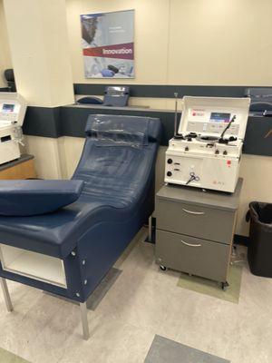 Donor floor with donation chair and plasma machine.