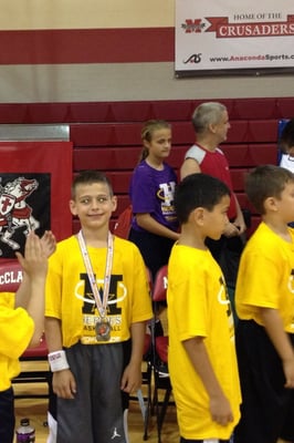 Joey receiving his Medal for basketball