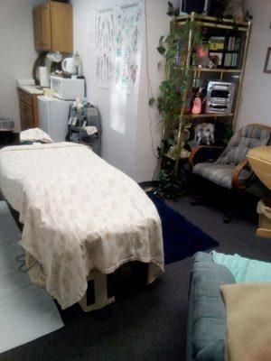 My adjustable massage table, and my session
Room.