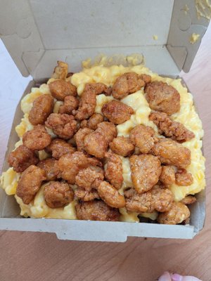 Box topped w/mac and cheese AND crispy chicken (which is doused in hot honey)