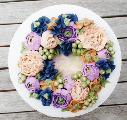 All buttercream floral wreath cake