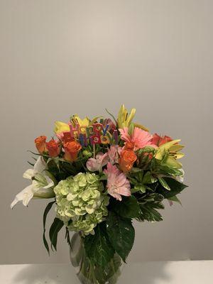 Spray Roses Hydrangea Lillies Roses and Mixed Greens