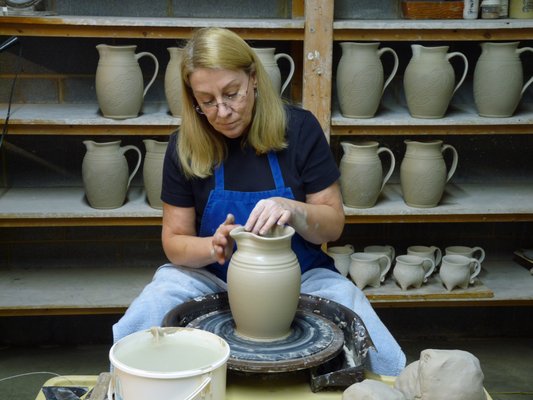 Sylvia making pitchers