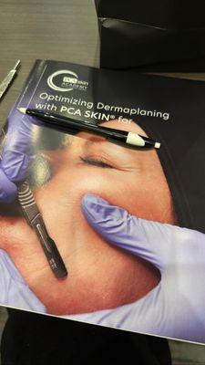 Dermaplaning: Exfoliate & remove fuzz for smoother, glowing skin. No downtime! ‍ #SkincareMagic