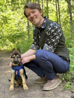 Dr. David Campbell and his puppy Enoch taking a hike in Post Falls Community Forest.