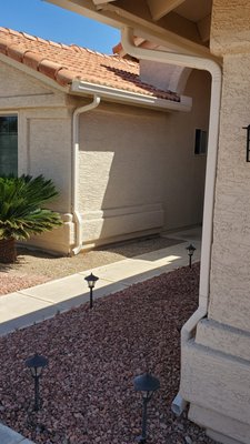 Replaced one gutter and added a new one on opposite side of entryway.