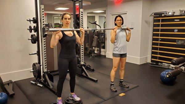 Two clients working out together