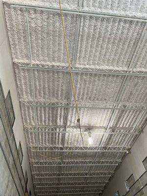 Areas in the building where Compass Insulation installed white K-13 sprayed acoustic insulation.