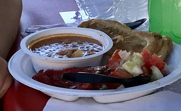 Homemade chicken soup in a tomato broth with carrots, celery, potatoes!! Cucumber tomato summer salad (!!), and sausage pastry!